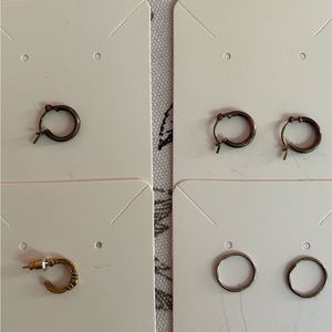 4 pierced rings.  2 sets, 2 singles.  Bronze, gold, & silver.  NEW